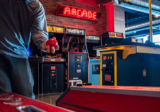 Venue full of arcade machines at "Punch Bowl Social"