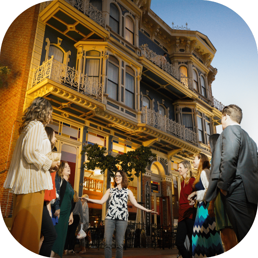 People standing in front of a historical building in the Gaslamp Quarter