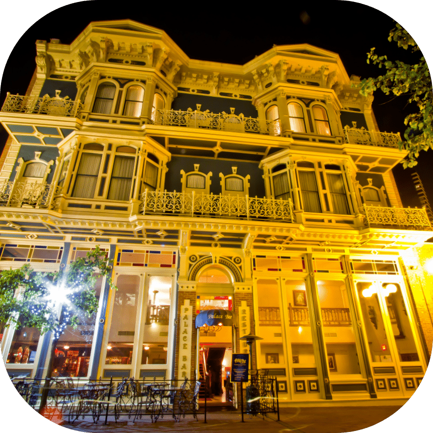 brothes-book-now-BG@2x A historical building in the San Diego Gaslamp quarter