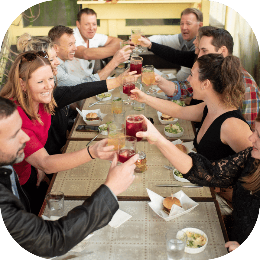 drinks-galore-bg@2x a group of people eating Italian food during their Little Italy walking tour