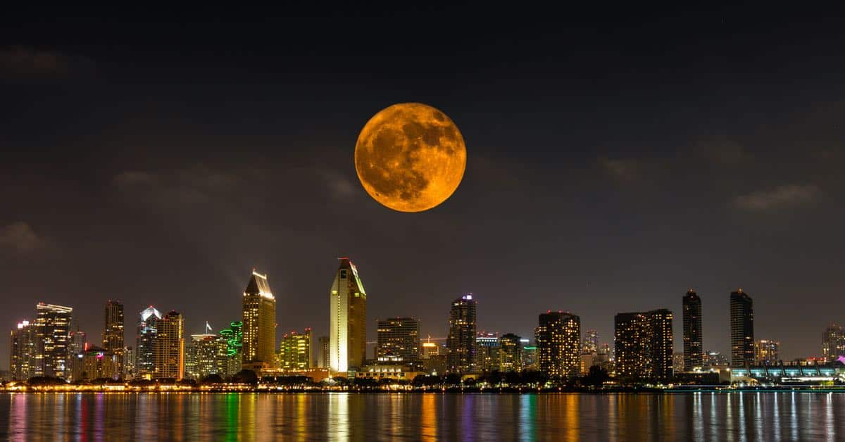 San Diego downtown skyline with a full moon on Halloween