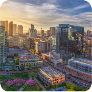 Skyscrapers glowing at golden hour during a downtown San Diego brewery tour