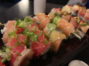 An assortment of sushi rolls, a fresh coastal seafood famous in san diego